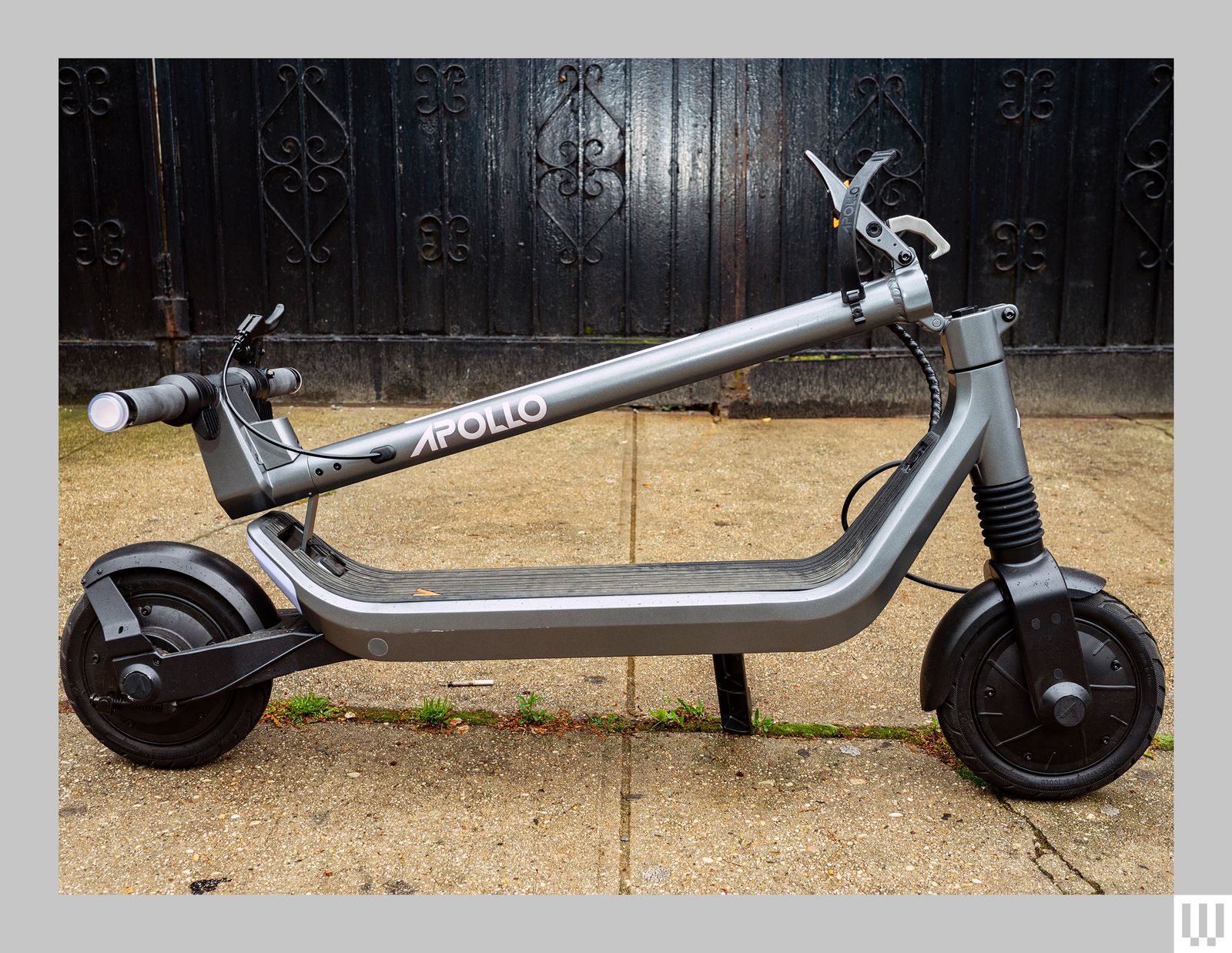 Side view of Apollo Go electric scooter with the handle bar folded down